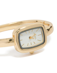 Showcasing a women's analog bangle watch with white dial and rectangle shape, featuring a link-band in gold strap color for formal occasion wear, watch face detail view - link has visual effect only