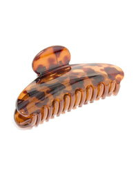 Tortoiseshell arched claw clip in chocolate sienna and peru tones front view - link has visual effect only
