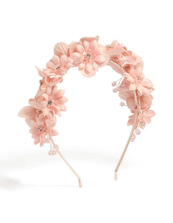 Beautifully crafted beaded floral headband with jewelled accents in rose gold and glass material front view