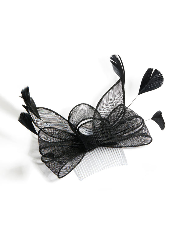 Elegant black loop feather fascinator hair comb with solid white accents front view