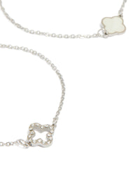 Featuring waterproof stainless steel cubic zirconia flower bracelets in a 2-pack with crystal accents, and silver ivory tones close up view - link has visual effect only
