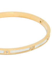 Elegant waterproof gold plated stainless steel hinged bangle with cubic zirconia and white enamel inlay close up view - link has visual effect only