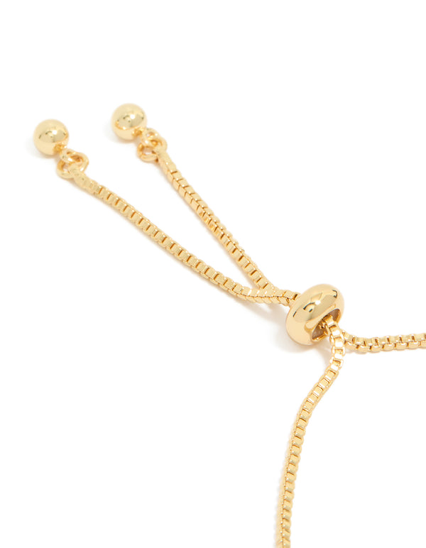 Detailed gold plated thin double cubic zirconia tennis toggle bracelet closure detail view