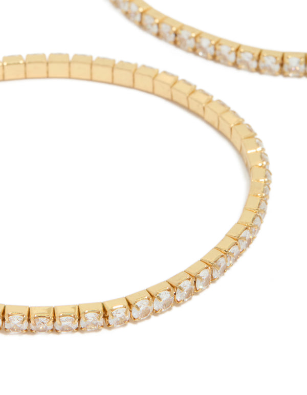 Showcasing gold plated cubic zirconia stretch tennis bracelets in a dainty 2-pack close up view