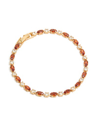 Showcasing a gold plated tennis bracelet with clear and cognac cubic zirconia in multi cut design front view - link has visual effect only
