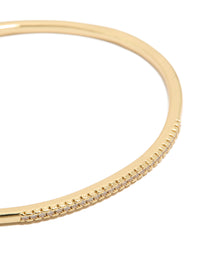 Detailed look at a gold plated cubic zirconia thin wrist cuff bangle close up view - link has visual effect only