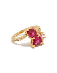 Stunning gold plated ring with double red pear cut cubic zirconia and statement design side detail view - link has visual effect only