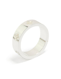 Elegant waterproof stainless steel band ring featuring floral cubic zirconia embellishments in silver and clear stone, dainty style side detail view - link has visual effect only