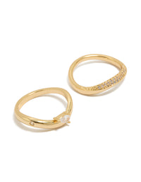 Crafted from gold plated metal with pear cut cubic zirconia stones, these crystal statement stacking rings come in a dainty 2-pack design front view - link has visual effect only