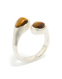 Showcasing a waterproof stainless steel ring with double tigers eye stones in gold and silver tones front view - link has visual effect only