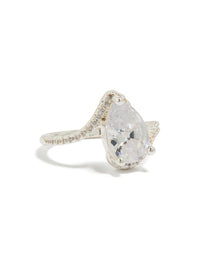 Showcasing a silver plated pear cubic zirconia engagement ring with crystal accents and statement design in clear side detail view - link has visual effect only