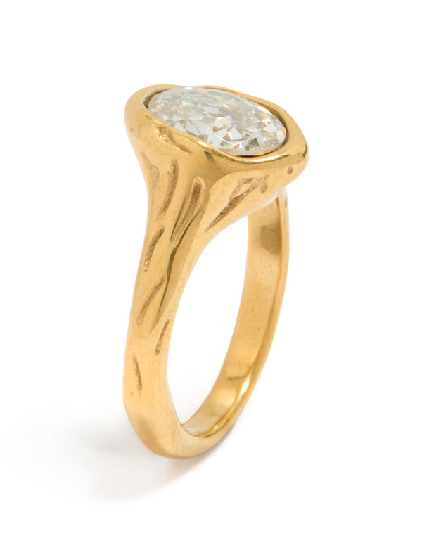 Featuring a waterproof gold plated stainless steel oval cubic zirconia molten ring with crystal and statement design front view
