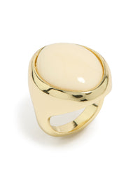 Featuring a gold plated chunky oval cream stone ring with statement design front view - link has visual effect only