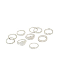 Showcasing a silver diamante and signet rings 10-pack with celestial star features front view - link has visual effect only