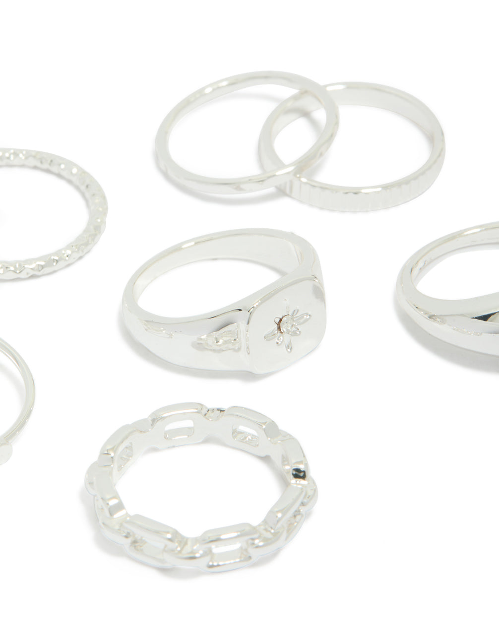 Featuring celestial dainty rings with bubble, chain, and star accents in silver close up view