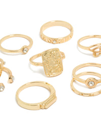 Featuring gold Roman numeral and diamante rings in a dainty 9-pack disc details close up view - link has visual effect only