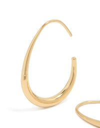 Showcasing waterproof stainless steel hoop earrings with gold plated finish in 30 MM size close up view - link has visual effect only