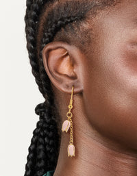 Waterproof gold plated stainless steel pink tulips drop earrings featuring floral pattern on ear view - link has visual effect only
