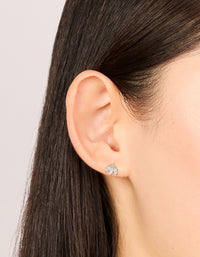 Featuring waterproof stainless steel triple marquise clear cubic zirconia flat back studs in silver on ear view - link has visual effect only