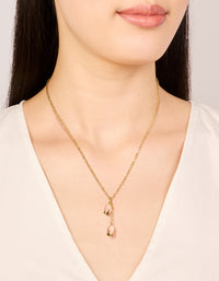 Featuring waterproof gold plated stainless steel pink tulips pendant necklace with floral in dainty style on neck view - link has visual effect only