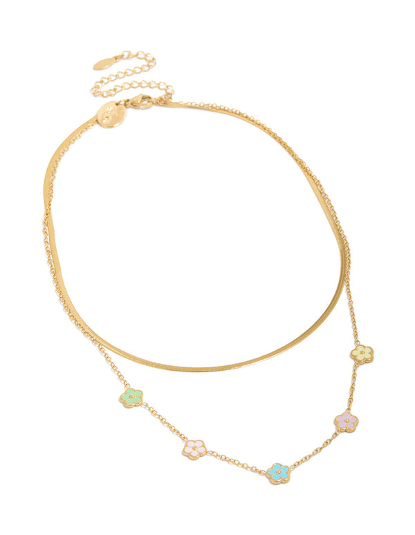 Featuring a waterproof snake chain layered necklace with floral charm in gold plated stainless steel front view