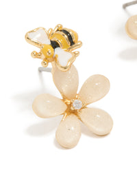 Explore the cutesy pink flower and enamel bee stud earrings in gold plated dainty style with floral feature close up view - link has visual effect only