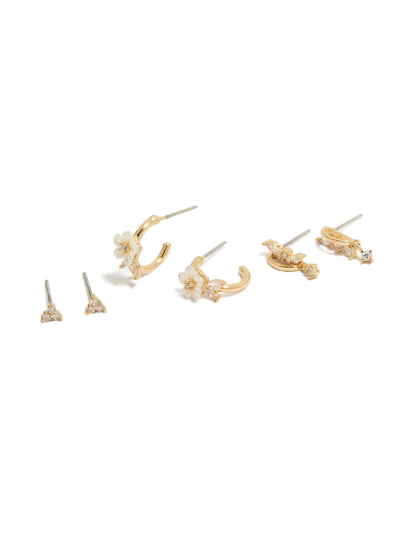 Showcasing dainty huggie earrings with butterfly and floral details, crafted from gold plated crystal cubic zirconia in a 3-pack front view