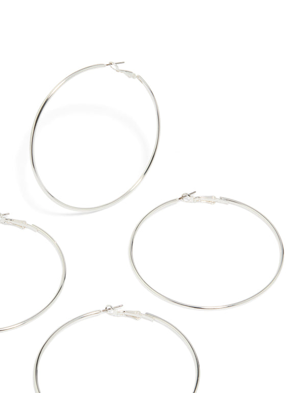 Crafted from silver with large hoop closure in a 2-pack post detail view