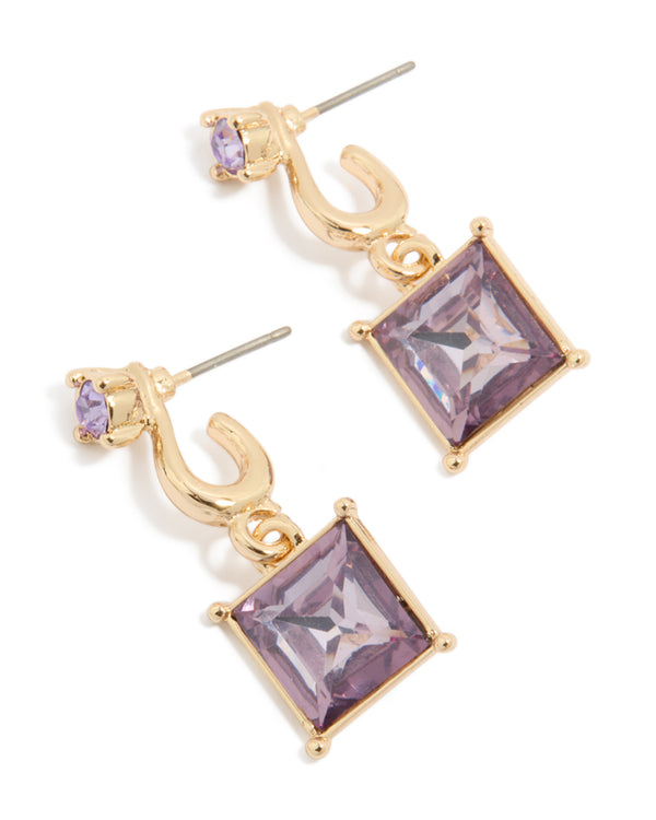 Showcasing statement drop earrings with square purple diamante stones in gold setting front view