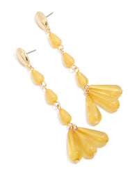 Showcasing statement drop earrings featuring beaded design in gold and orange front view - link has visual effect only
