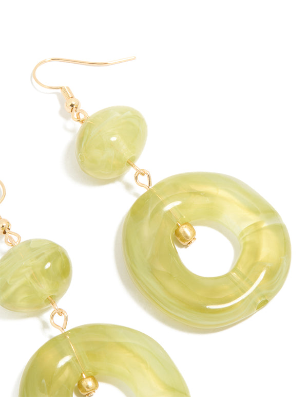 Designed with gold green acrylic circle drop earrings post detail view