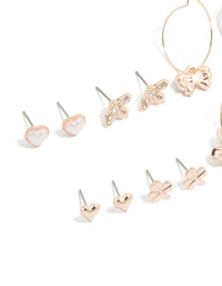 Explore rose gold pearlised flower and bee earrings 8-pack with bow, butterfly designs, heart details, ivory pearls, stud and huggie closures close up view - link has visual effect only