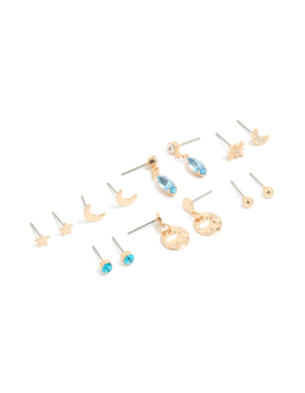 Discover this stud earrings 7-pack featuring celestial designs with disc, star, and moon motifs and gold finish front view