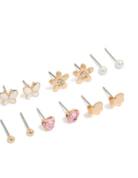 Shop this butterfly and pearl stud earrings 7-pack crafted from enamel featuring heart in gold, white, light pink, and clear post detail view - link has visual effect only