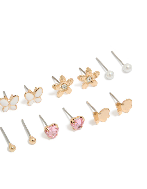 Shop this butterfly and pearl stud earrings 7-pack crafted from enamel featuring heart in gold, white, light pink, and clear post detail view