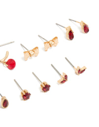 Crafted from gold red flower and bow earrings 7-pack with floral details featuring stud and huggie closures in maroon detail view - link has visual effect only