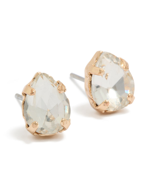 Showcasing gold teardrop diamante stud earrings with clear stones in front view