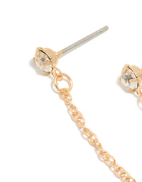 This gold diamante and chain stud earring showcases a statement style with secure closure close up view - link has visual effect only