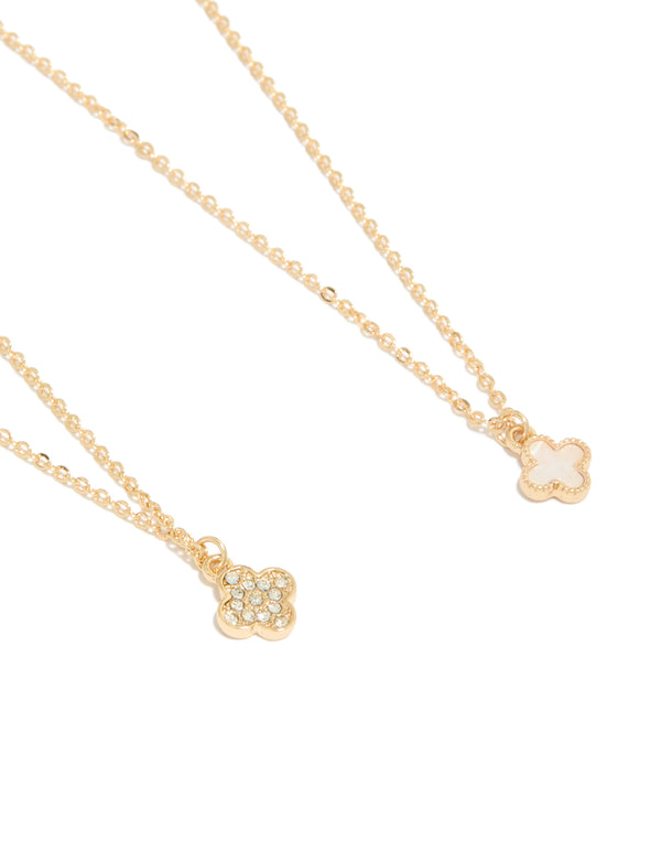Featuring gold diamante and smooth flower pendant necklaces in a 2-pack close up view