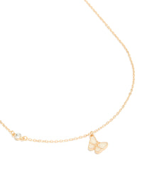 Featuring a diamante and butterfly pendant necklace in gold close up view - link has visual effect only