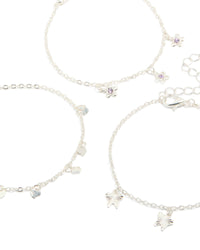 Crafted from silver, these dainty garden bracelets in a 3-pack feature butterfly, floral and heart charms close up view - link has visual effect only