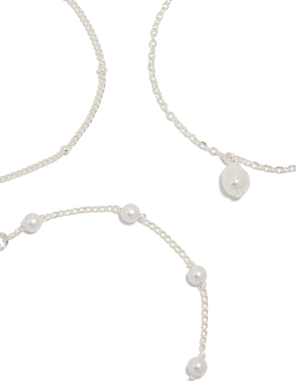 Detailed silver pearl, ball and station drop bracelets in a 3-pack close up view