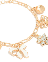 Gold Shell, Floral &  Bow Charm Bracelet - link has visual effect only