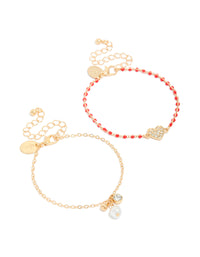 Showcasing gold red beaded diamante heart and pearl bracelets in a 2-pack with charm details front view - link has visual effect only