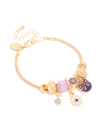 Beautifully crafted gold bow and music note charm bracelet featuring beads, floral accents, and heart details in purple, pink, and white front view - link has visual effect only