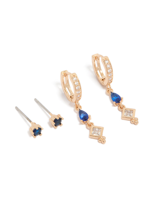 Featuring crystal and cubic zirconia details in huggie and stud closures, this 2-pack set showcases gold tones with royal blue and clear stones front view