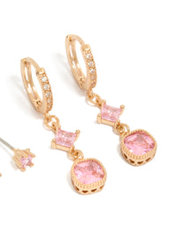 Featuring gold pink cubic zirconia stud and huggie earrings 2-pack with charm details and crystal accents close up view - link has visual effect only