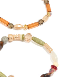 Crafted with neutral acrylic irregular beaded stretch bracelets in a 4-pack, showcasing chunky design in olive, orange, and sienna close up view - link has visual effect only