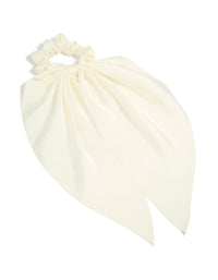 Crafted from solid ivory fabric, this simple cream long scarf scrunchie front view - link has visual effect only