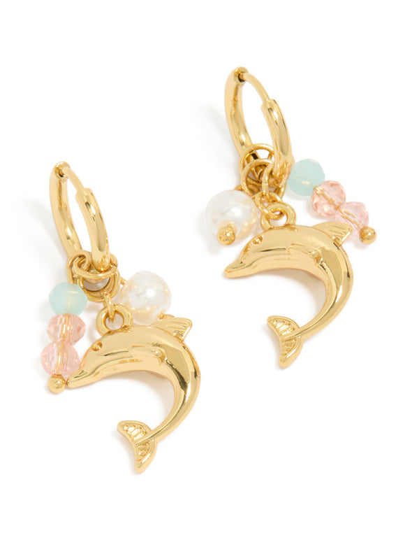 Showcasing waterproof gold plated stainless steel huggie earrings with dolphin charm, beads, pearl accents, and ocean-inspired design front view